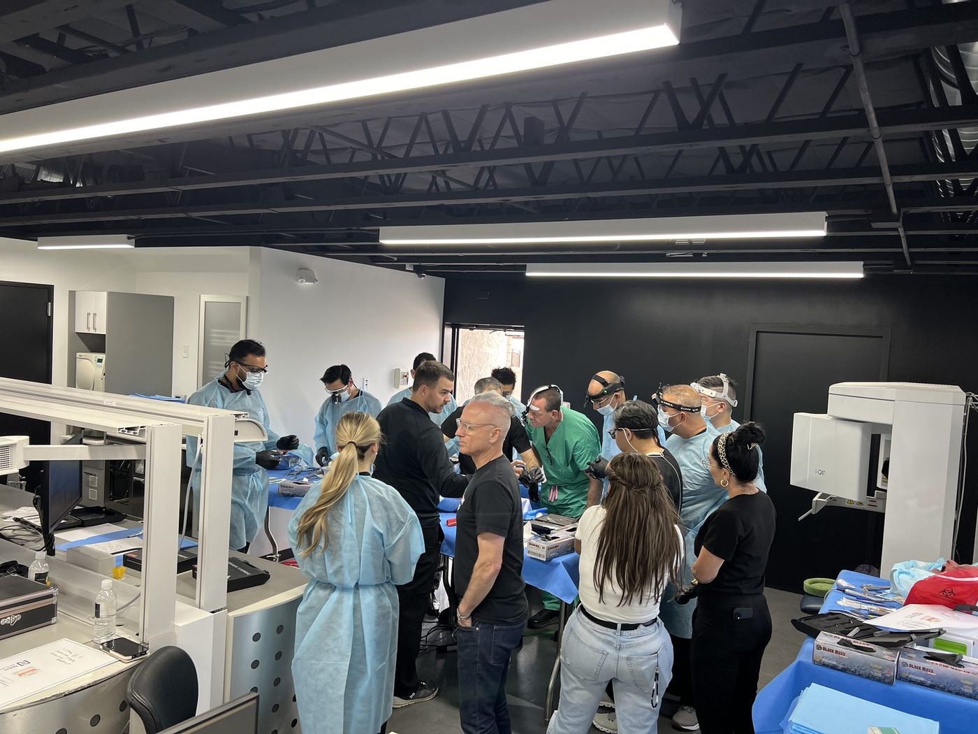 Dentists practicing the full-arch surgical sequence on cadaver specimens during the All-on-4 cadaver course in Phoenix