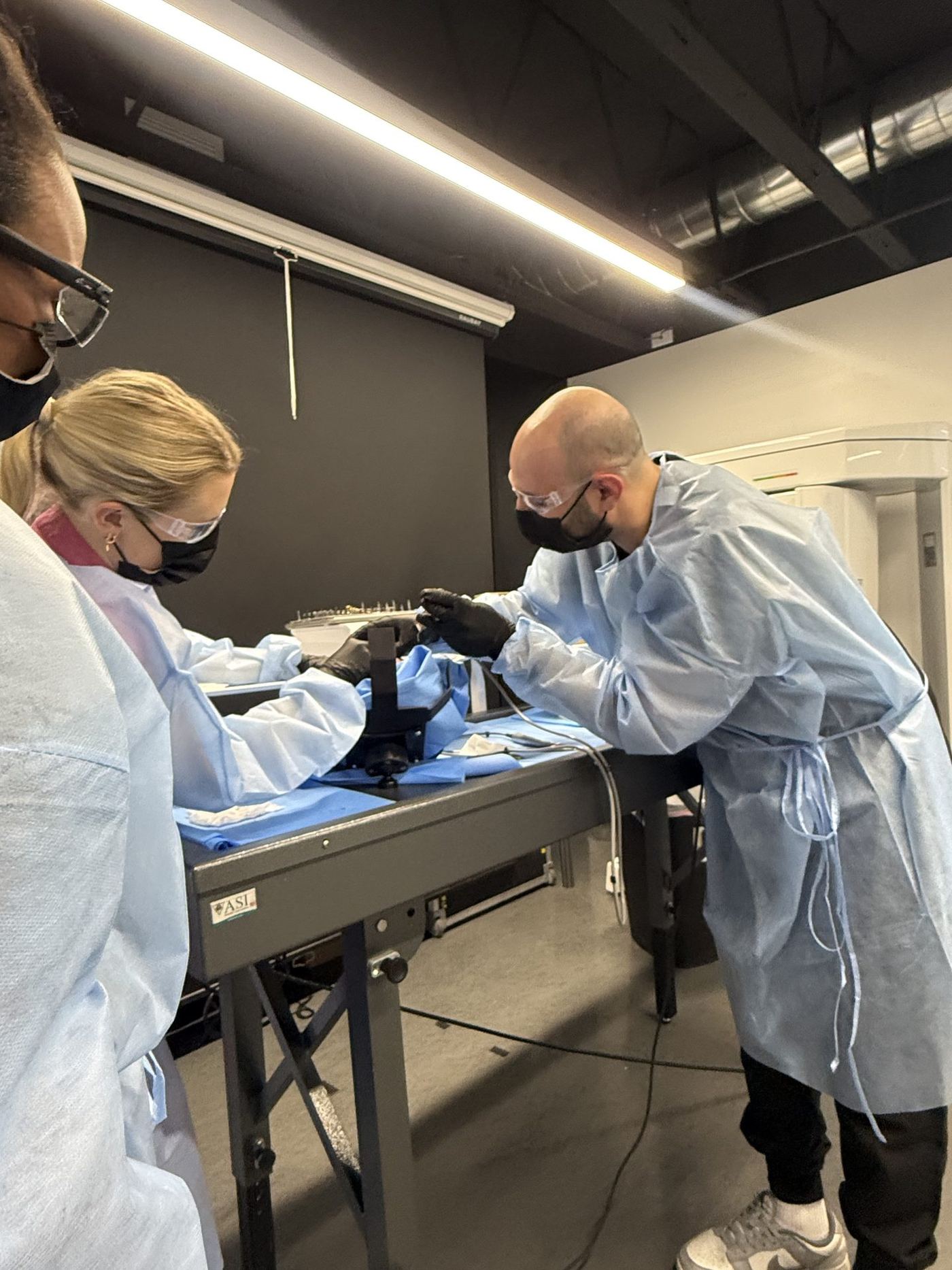 Cadaver training stations prepared for a dental implant course