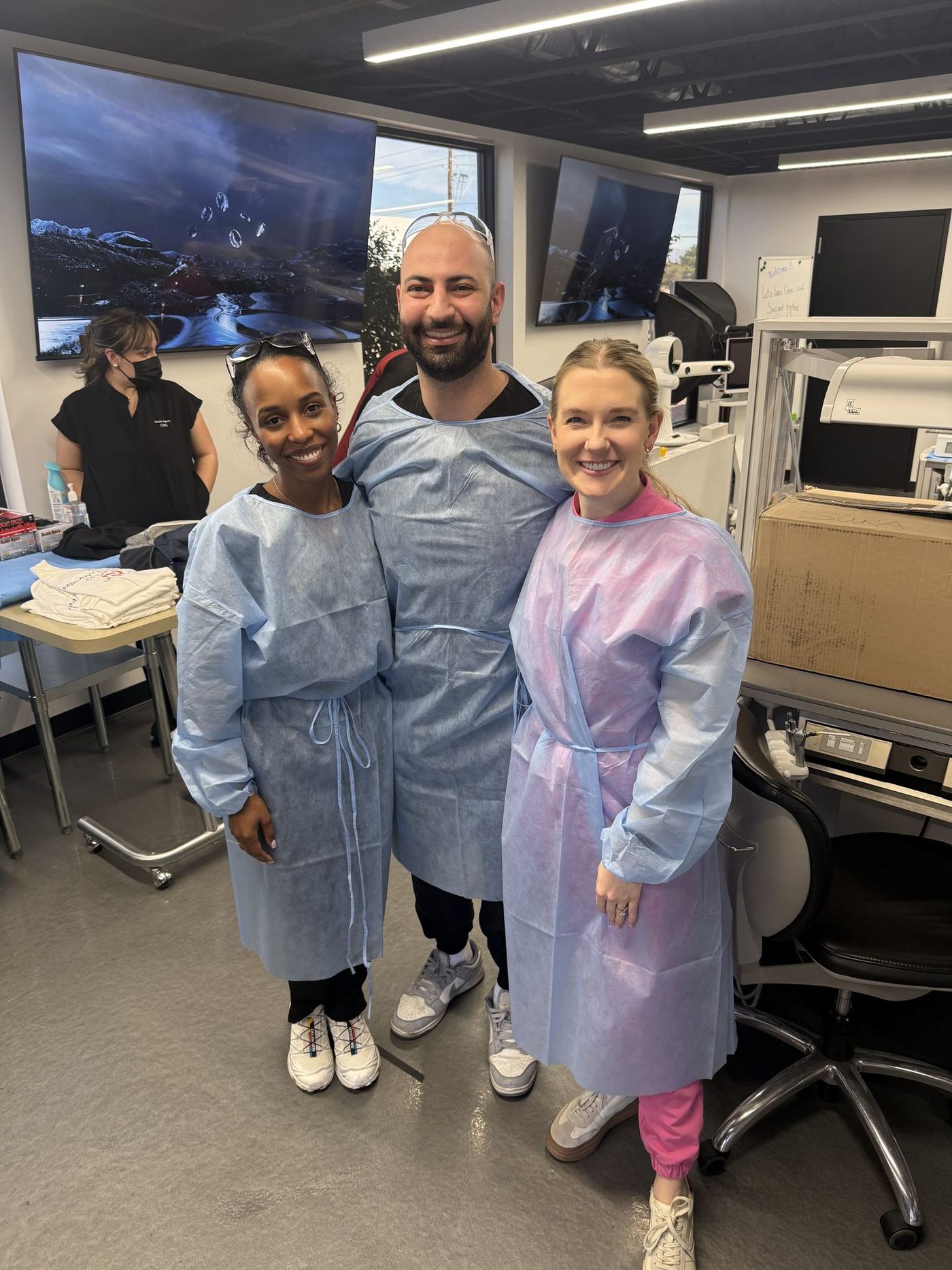 Three dentists at the Implant Education Company training center